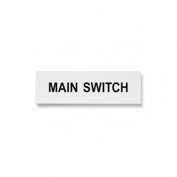 White traffolyte label with black engraved