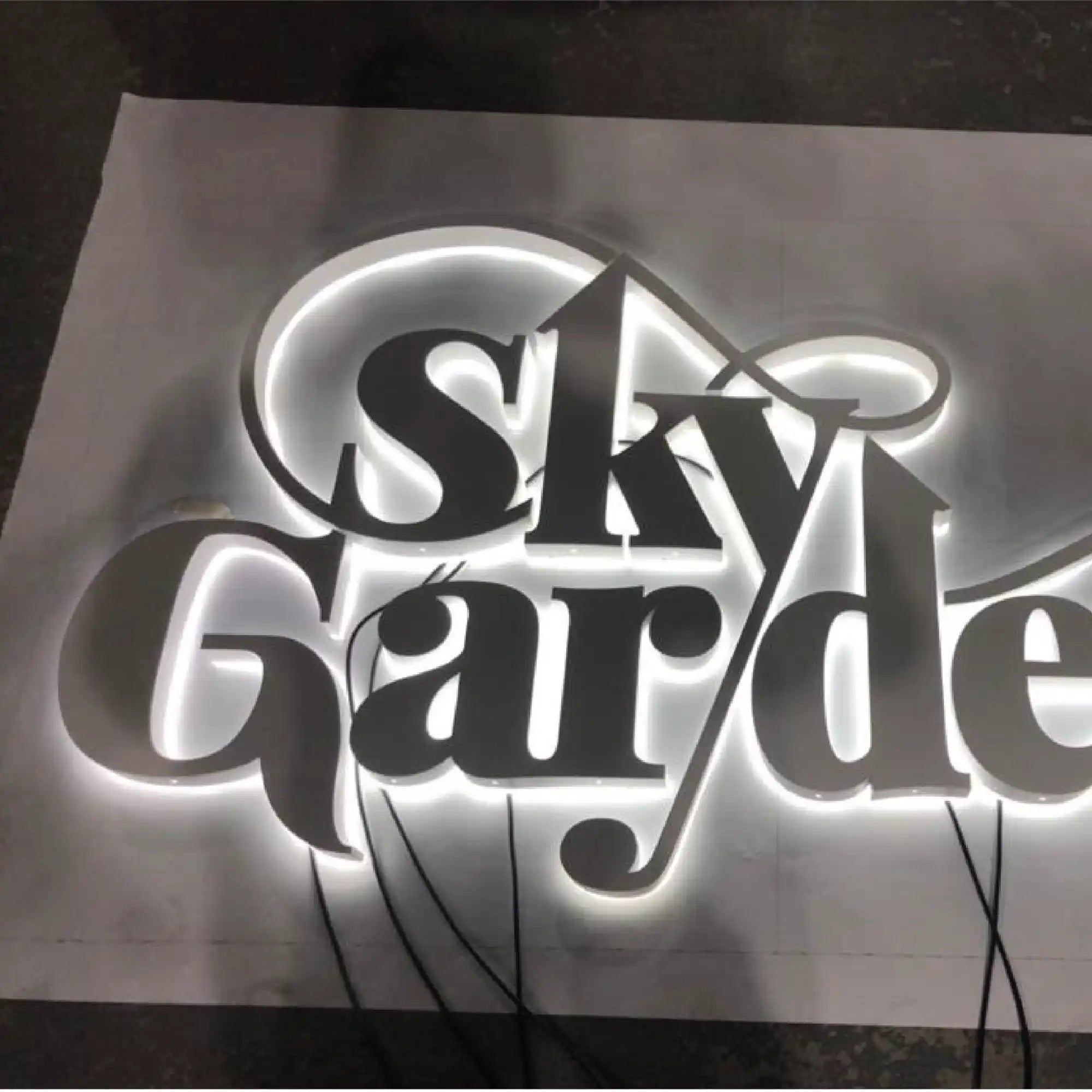 Backlit ’Sky Garden’ business sign with white LED lighting.