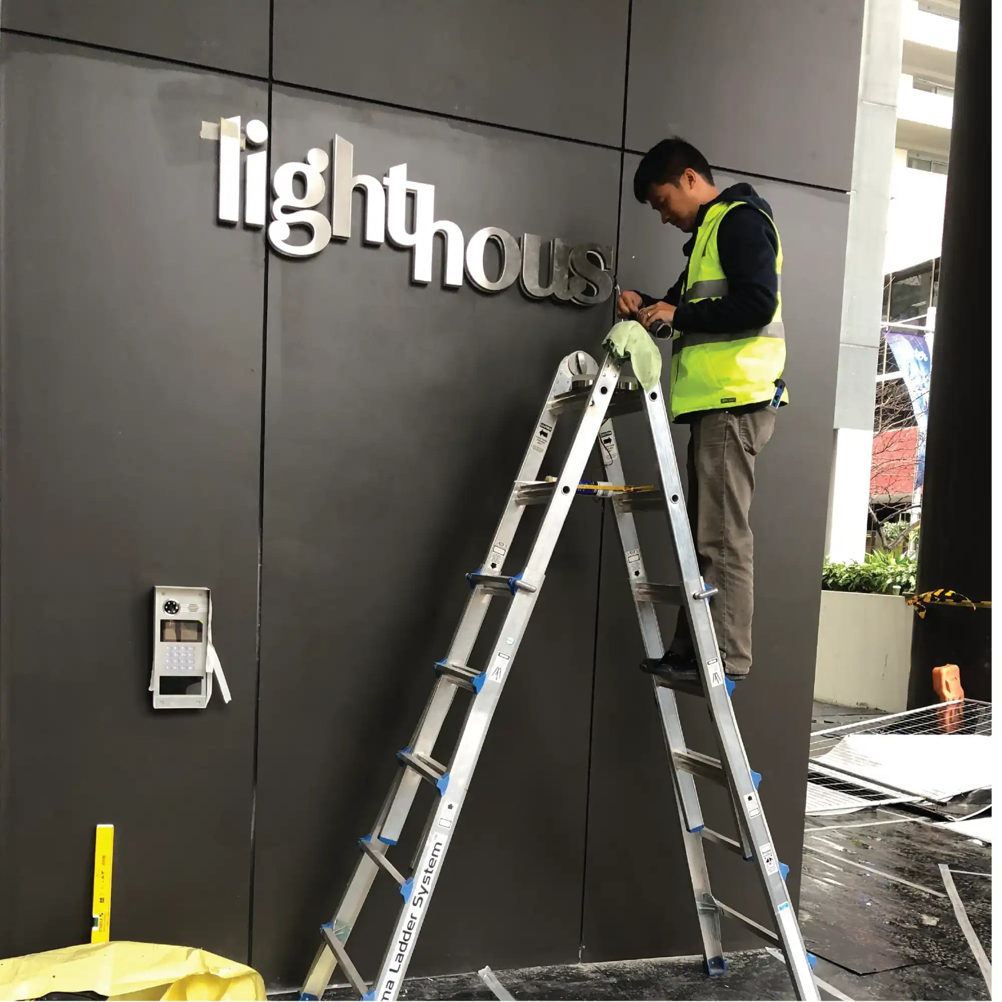 A multi-purpose extendable ladder with several rungs.