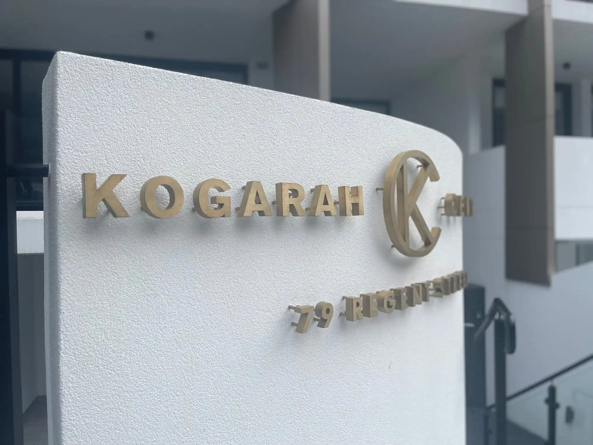 Dimensional gold building lettering