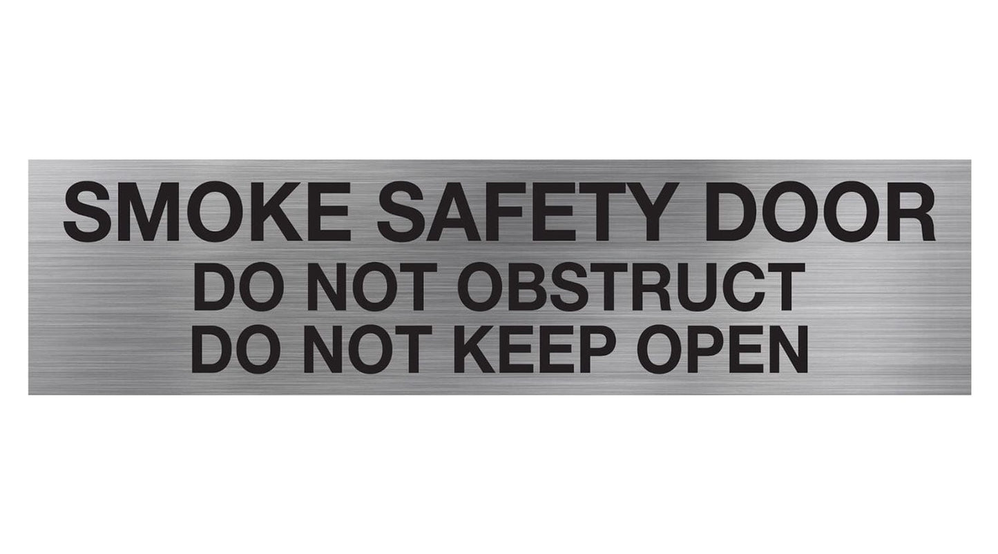 SMOKE SAFETY DOOR DO NOT OBSTRUCT DO NOT KEEP OPEN SIGN